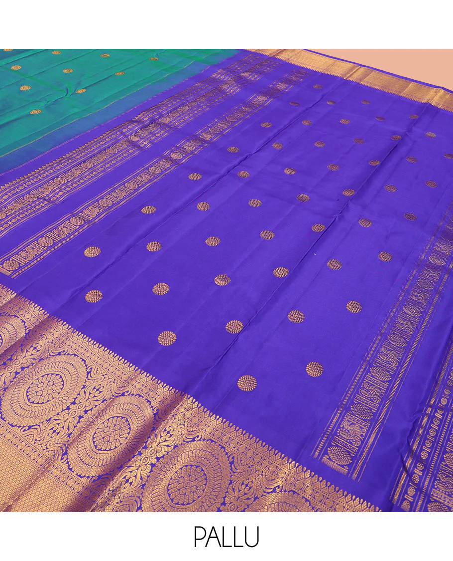 Blue chakram buttas Kanchipuram silk saree, contrast border of muthu, rudraksham,  poo chakram, and mayil kann designs, and chakram motifs pallu - Image 5