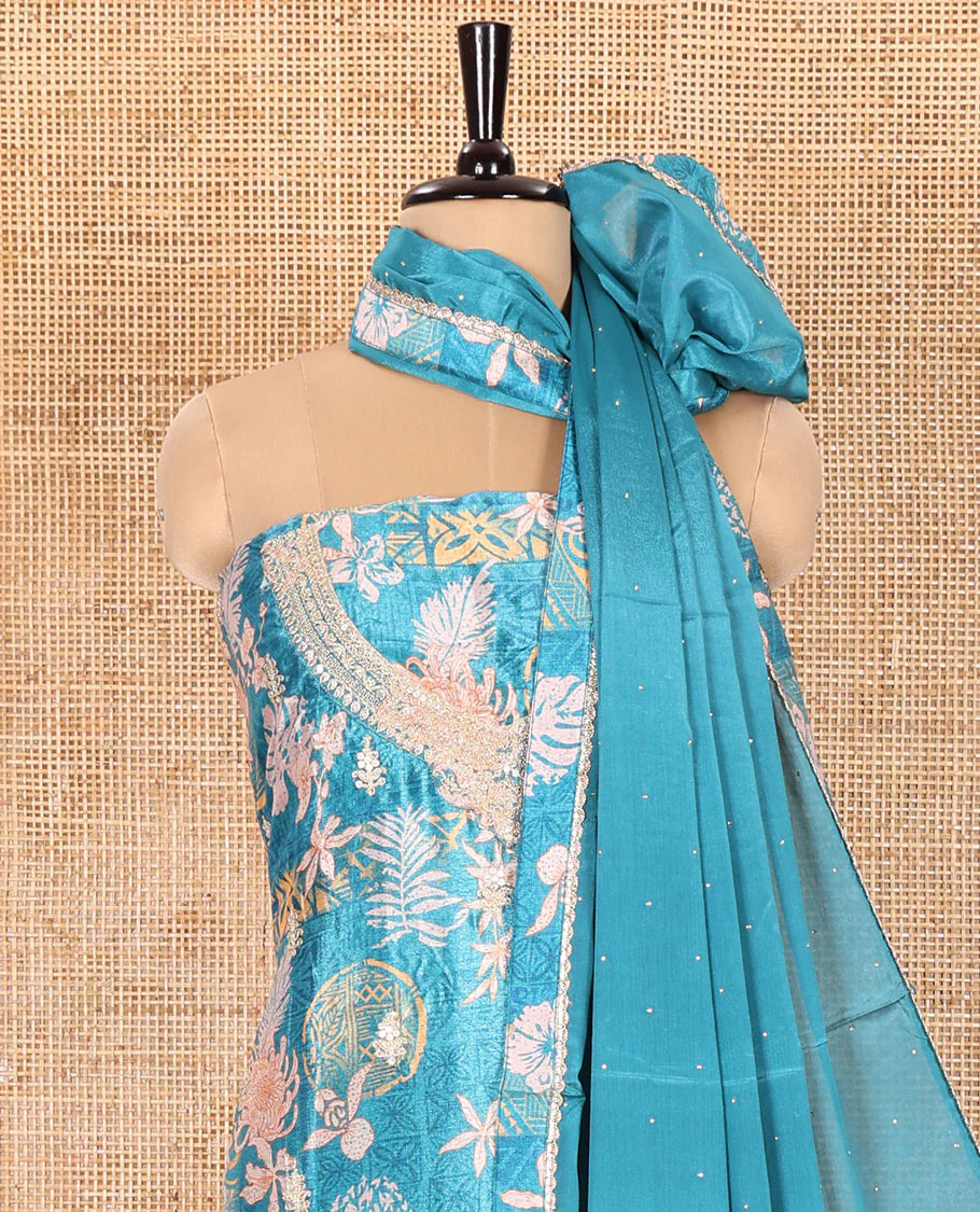 Blue Material Chudidar Set Embellished with Floral-Geometric Printed with Neck Embroidered Chinon Top, Subtly Made Plain Santoon Bottom, and a Chinon Dupatta Featuring Printed Border, and Glitter Dots - Image 3