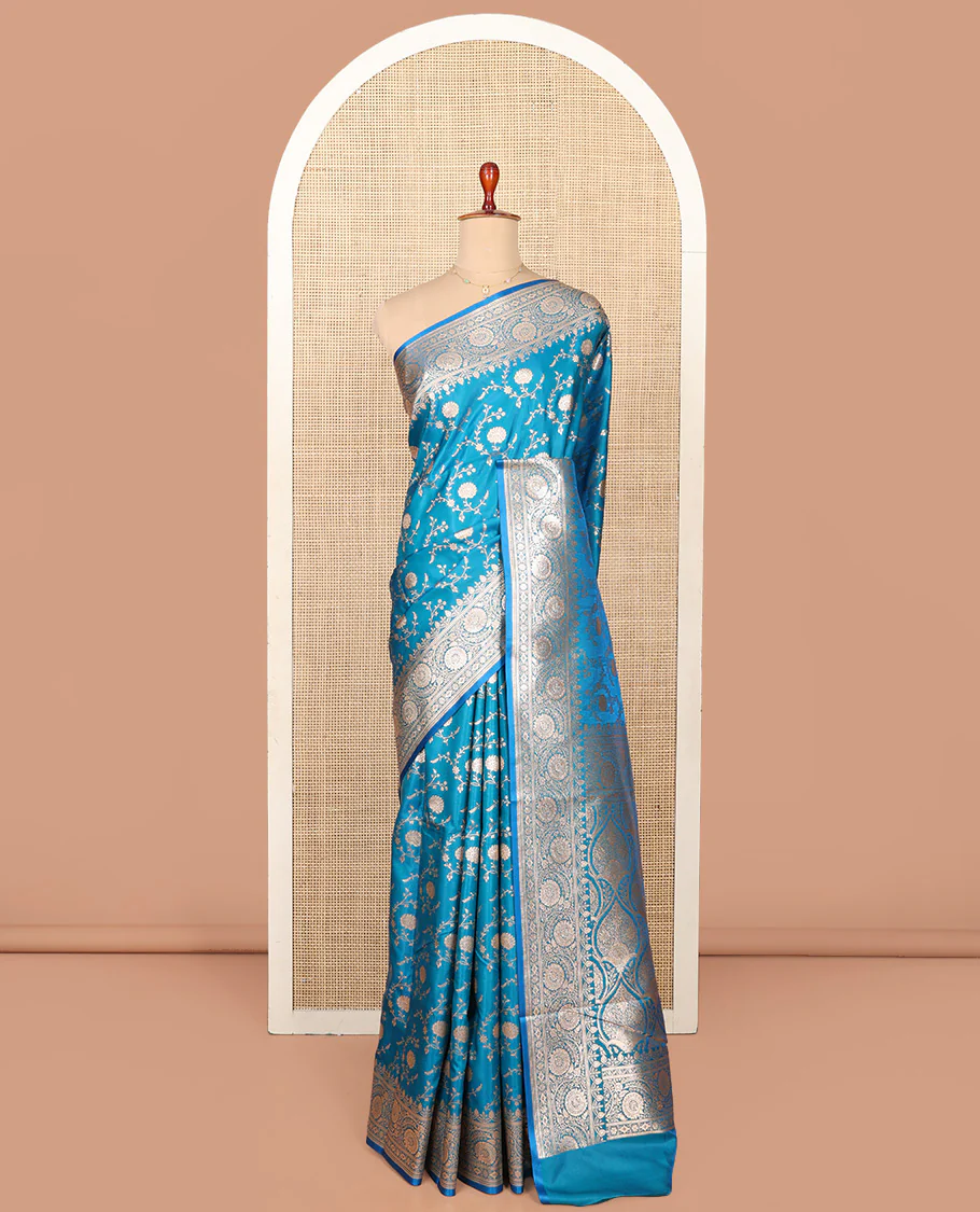 Blue Semi-Banaras Saree, Majestically Detailed with Floral Jaal Jacquard on Its Body, Highlighted by a Floral Creeper Design Border, Intricately Designed Zari Pallu, and Paired with a Matching Blouse - Image 3