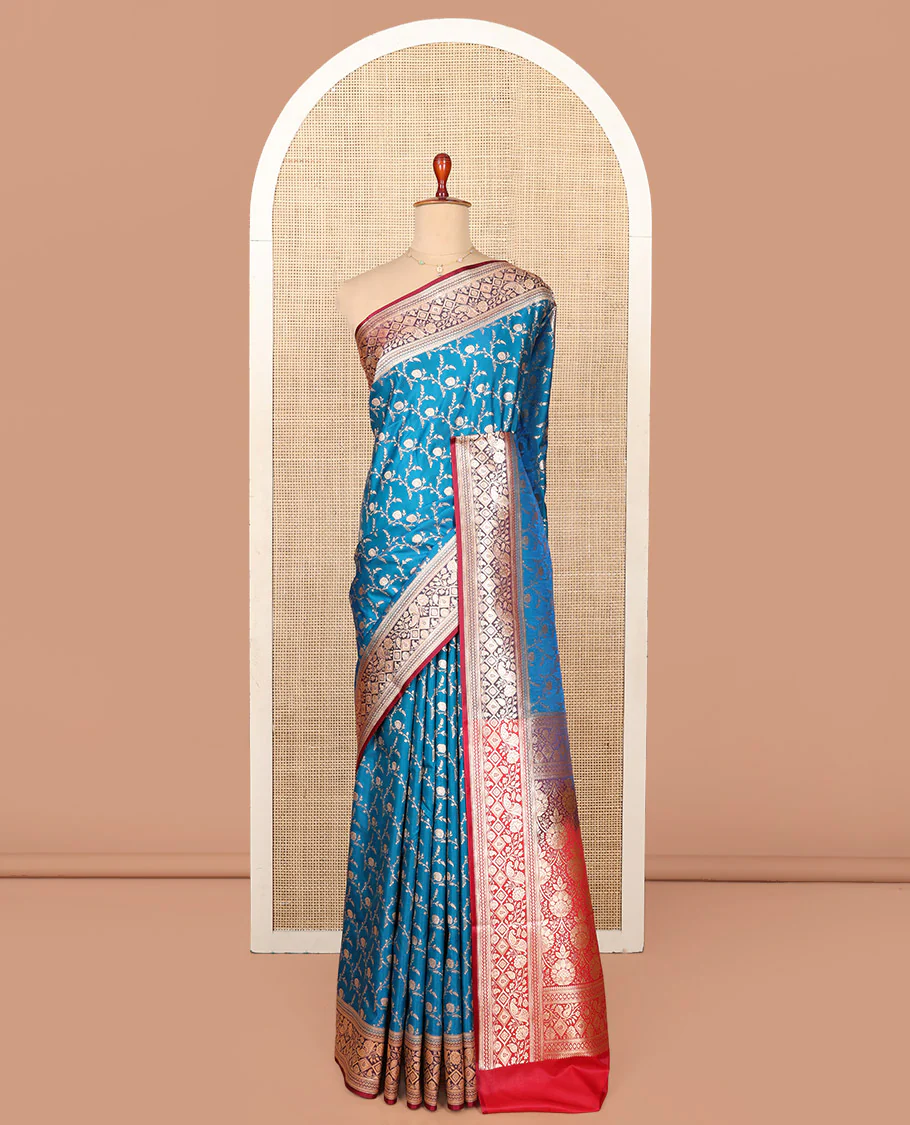 Blue Semi-Banaras Saree, Mesmerized with Jaal Jacquard on Its Body, Complemented by a Contrast Floral, Paisley, and Geometric Design Border, Intricately Designed Pallu, and Paired with a Contrast Blouse - Image 3
