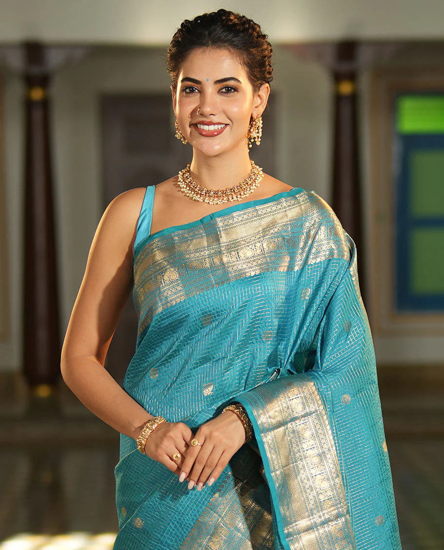 Blue Vasundhara Lite Silk Mix Saree, Richly Detailed with Zari Buttas and Zari Checks All Over Its Body, Highlighted by a Zari Border of Manga, Neli, Kamalam, Mayil, and Vanki Designs, Gleaming Intricately Designed Pallu, and Paired with a Matching Blouse - Image 3