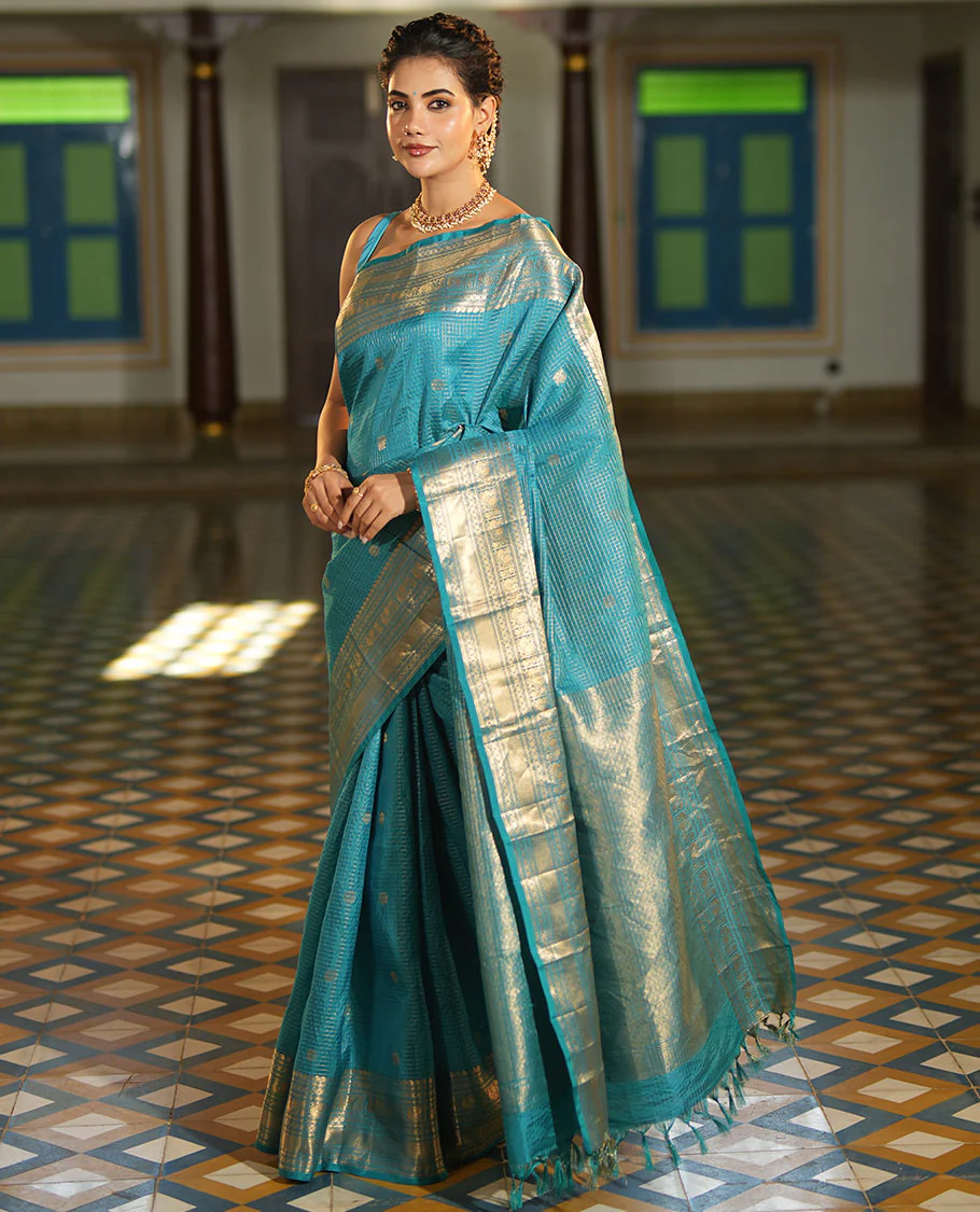 Blue Vasundhara Lite Silk Mix Saree, Richly Detailed with Zari Buttas and Zari Checks All Over Its Body, Highlighted by a Zari Border of Manga, Neli, Kamalam, Mayil, and Vanki Designs, Gleaming Intricately Designed Pallu, and Paired with a Matching Blouse - Image 5