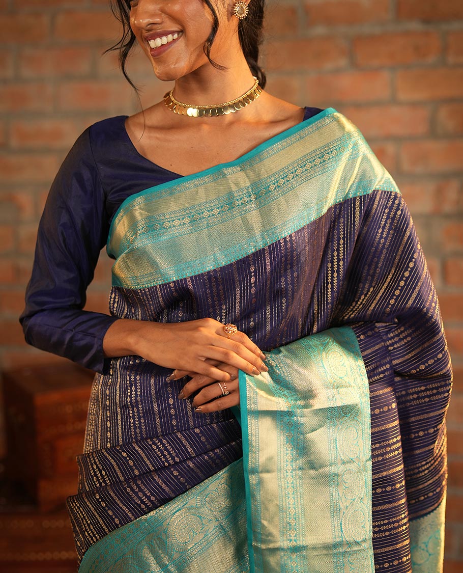 Blue Vasundhara Silk Saree Adorned with Jacquard Design Weave All Over Its Body, Complemented by a Contrast Border of Rekku, Muthu, Laddu Kamalam, Then Kuli Kann, and Dhavana Kodi Designs, Artfully Zari Woven Pallu, and Paired with a Contrast Blouse - Image 3