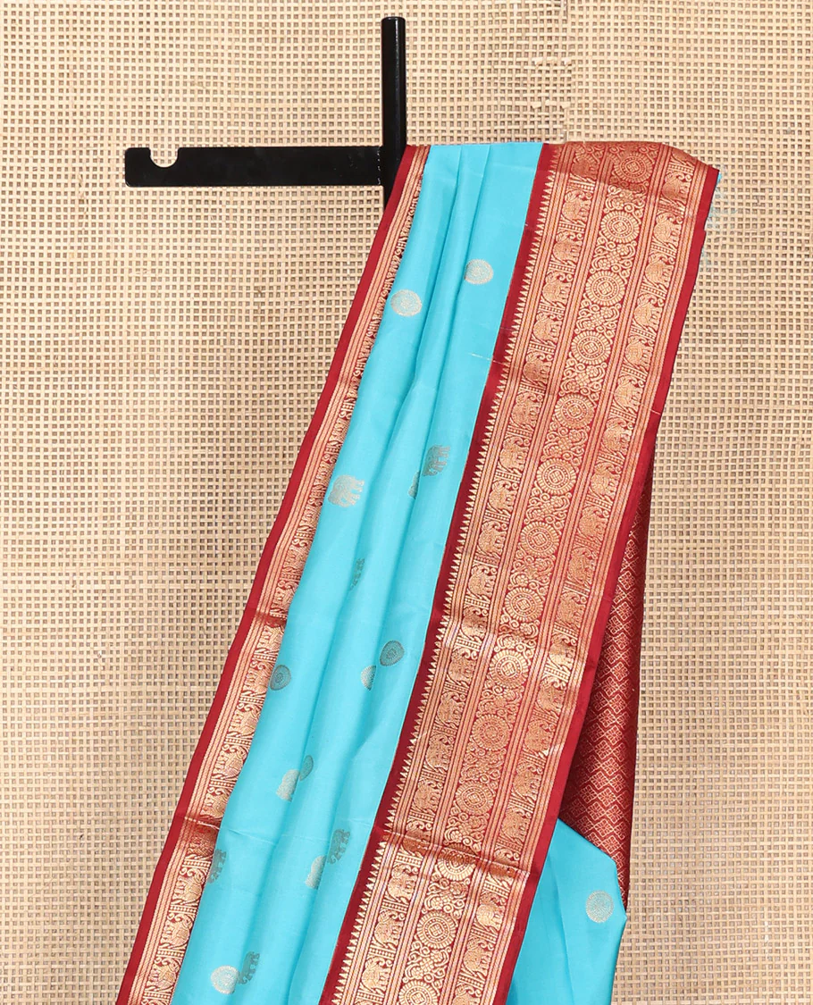 Blue Vasundhara Silk Saree, Embellished with Mayil and Yaanai Buttas Across Its Body, Complemented by a Contrast Korvai Border of Rekku, Banaras, Yaanai, and Chakram Designs, Gleaming Jaal Pallu, and Paired with a Contrast Blouse - Image 8