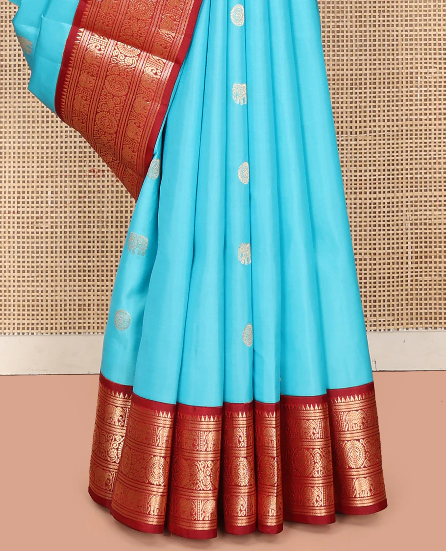 Blue Vasundhara Silk Saree, Embellished with Mayil and Yaanai Buttas Across Its Body, Complemented by a Contrast Korvai Border of Rekku, Banaras, Yaanai, and Chakram Designs, Gleaming Jaal Pallu, and Paired with a Contrast Blouse - Image 9