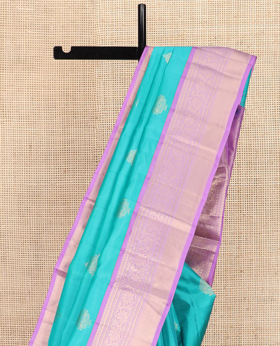 Blue Vasundhara Silk Saree Richly Detailed with Zari Buttas, Complemented by a Contrast Border of Thilakam Mokku, Kathir, Rudraksham, and Kodi Visiry Designs, Zari Designs Elevated Pallu, and Paired with a Contrast Zari-Bordered Blouse - Image 3