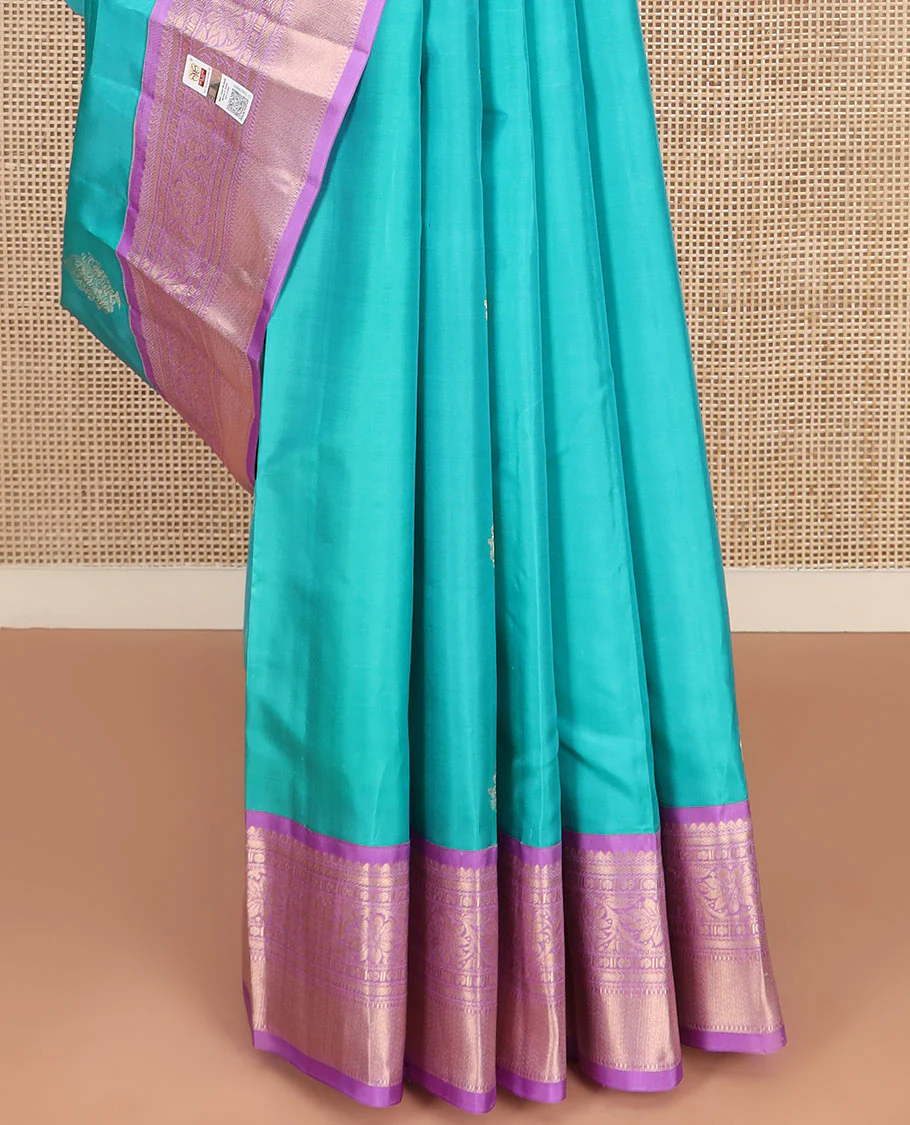 Blue Vasundhara Silk Saree Richly Detailed with Zari Buttas, Complemented by a Contrast Border of Thilakam Mokku, Kathir, Rudraksham, and Kodi Visiry Designs, Zari Designs Elevated Pallu, and Paired with a Contrast Zari-Bordered Blouse - Image 4
