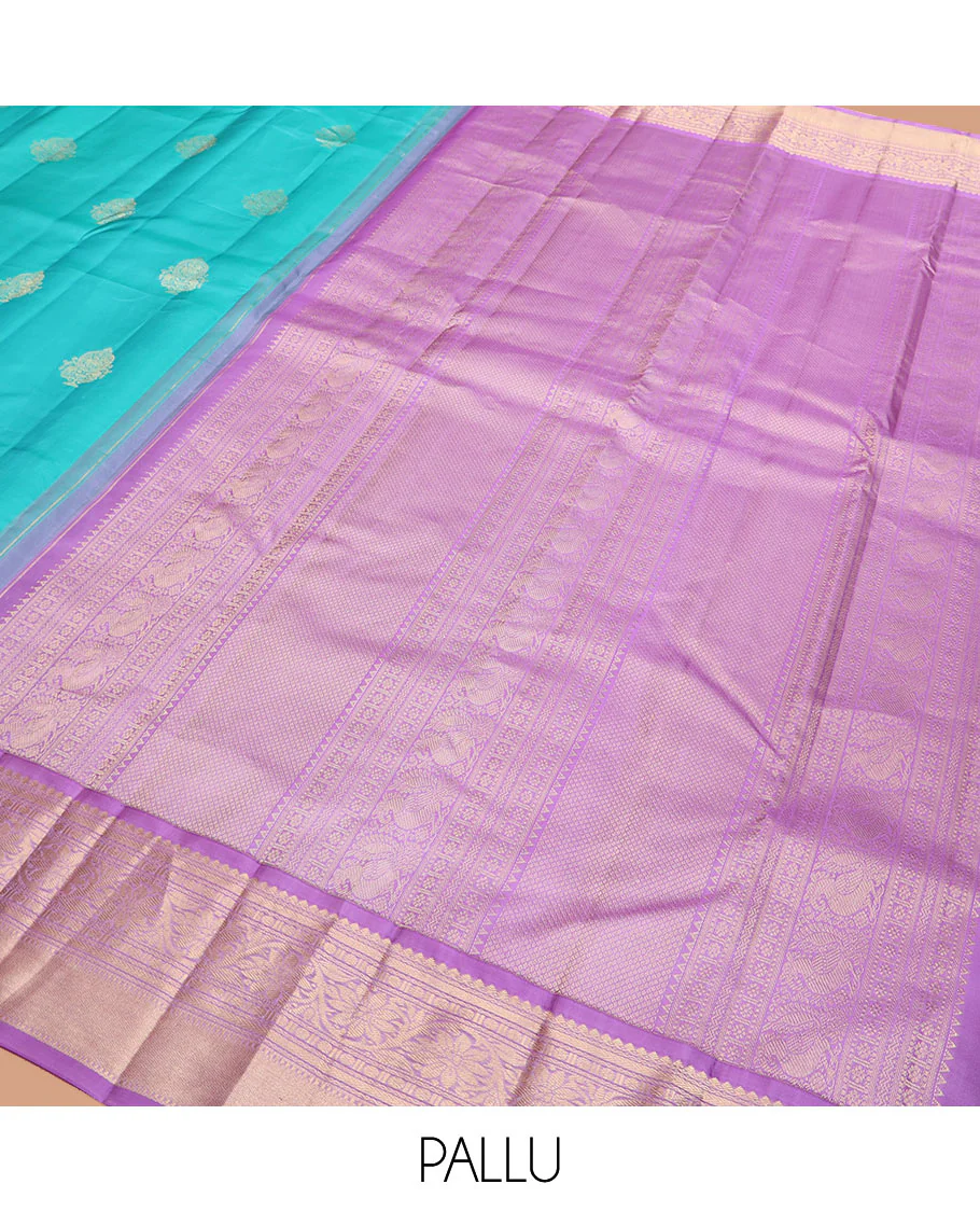 Blue Vasundhara Silk Saree Richly Detailed with Zari Buttas, Complemented by a Contrast Border of Thilakam Mokku, Kathir, Rudraksham, and Kodi Visiry Designs, Zari Designs Elevated Pallu, and Paired with a Contrast Zari-Bordered Blouse - Image 5