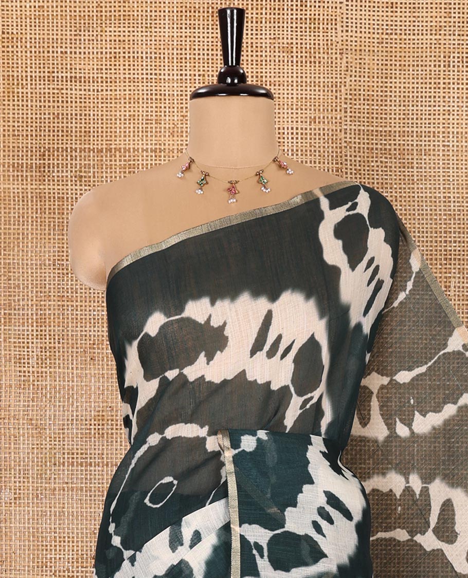 Borderless Green Linen Cotton Saree Accentuated with Shibori Prints, Complemented by Contrast Pallu Steeped with Floral Vine Print, and Paired with a Contrast Floral Printed Blouse - Image 2