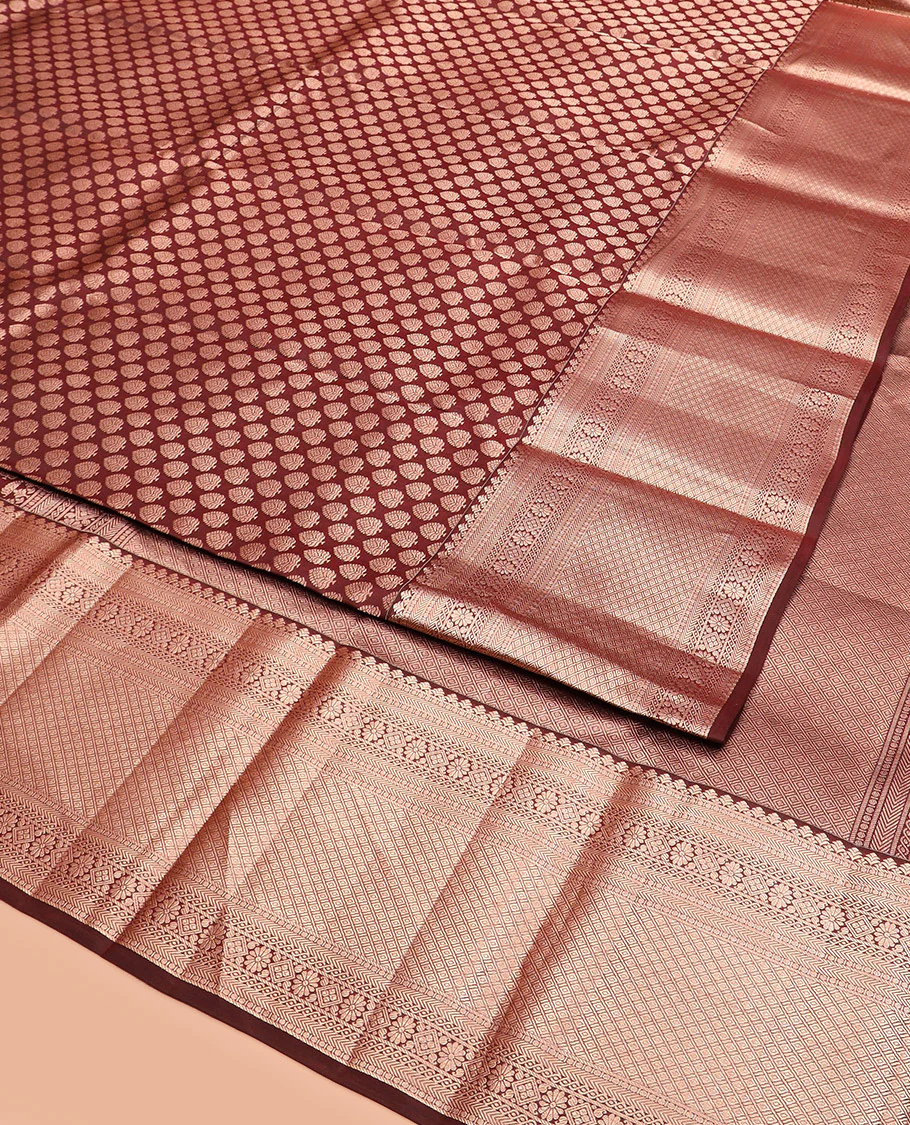 Brown Kanchipuram Silk Saree Enlivened with Zari Buttas, Complemented by Zari Border of Kathir, Neli, Kamalam, Chakram,  Manga, and Mayil Kann Designs, Pallu Decked Up with Mayil Kann Designs, and Paired with a Matching Blouse - Image 3