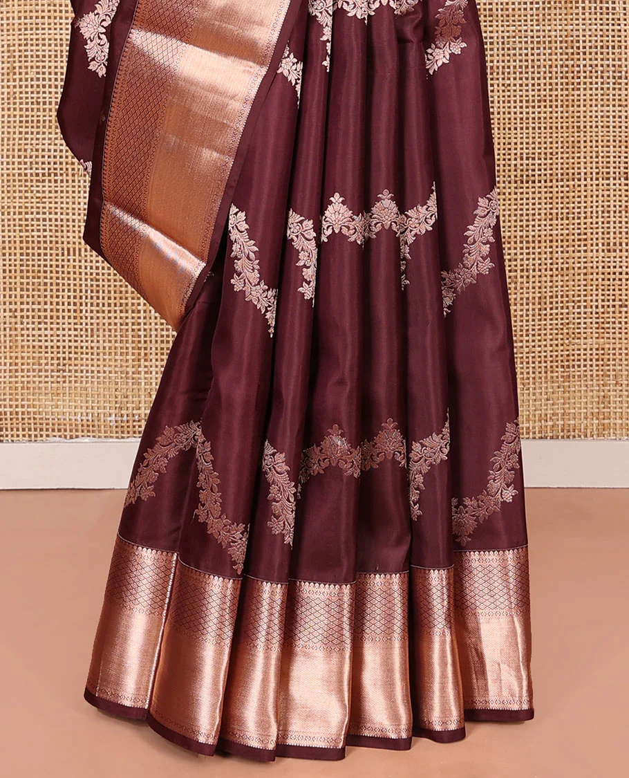 Brown Vasundhara Silk Saree Elegantly Sparkled with Floral Jaal Design All Over Its Body, Complemented by a Zari Border of Thilakam Mokku, Lavangam, Kathir, and Jaal Designs, Pallu Depicting Zari Jaal Designs, and Paired with a Matching Blouse - Image 4