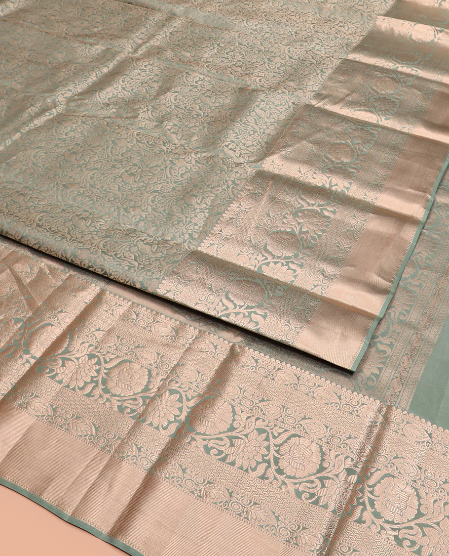 Green Kanchipuram Silk Saree Highlighted by Jacquard Design, Complemented by Zari Border of Thilakam Mokku, Manga, Jaal, and Kodi Visiry Designs, Pallu Elevated with Intricate Zari Designs, and Paired with a Matching Blouse - Image 3