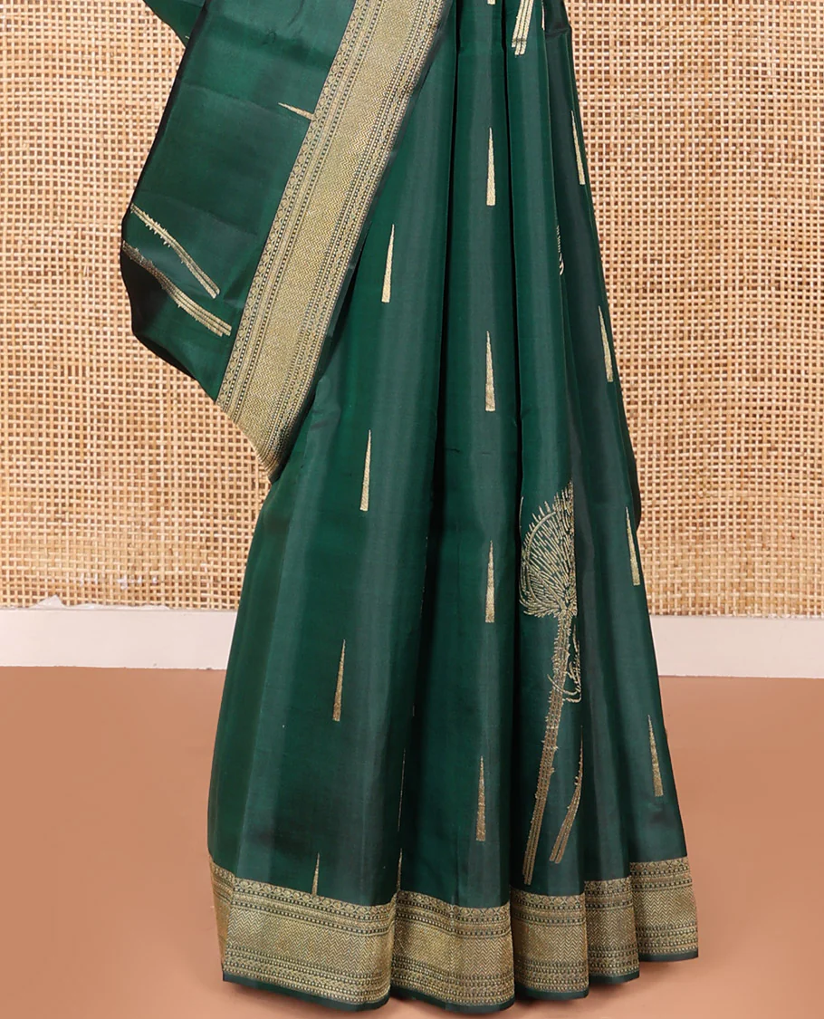 Green Vasundhara Silk Saree Creatively Designed with Thazampoo Rekku Buttas and Vel Buttas, Highlighted with a Zari Border of Manga, Muthu, Kathir, Neli, and Vanki Designs, Subtly Sparkled Pallu of Jaal Design, and Paired with a Matching Blouse - Image 4