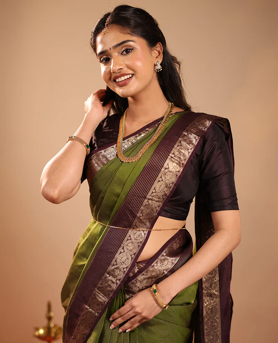 Green Vasundhara Silk Saree Mesmerized with Zari Micro-Checks All Over Its Body, Complemented by a   Contrast Border of Rekku, Kamalam, Mayil Kann, Yaanai and Mayil Designs, Subtly Sparkled Pallu of Jaal Designs, and Paired with a Contrast Blouse - Image 4