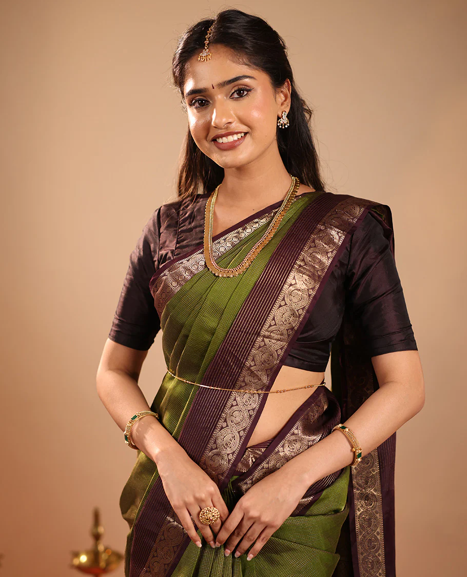 Green Vasundhara Silk Saree Mesmerized with Zari Micro-Checks All Over Its Body, Complemented by a   Contrast Border of Rekku, Kamalam, Mayil Kann, Yaanai and Mayil Designs, Subtly Sparkled Pallu of Jaal Designs, and Paired with a Contrast Blouse - Image 5