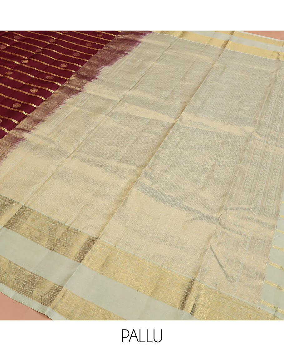 Maroon Vasundhara Silk Saree Richly Detailed with Zari Buttas and Zari Designs, Complemented by a Contrast Rettai Pettu Border of Round Mayil Designs, Subtly Designed Pallu of Floral Jaal Designs, and a Contrast Blouse - Image 5
