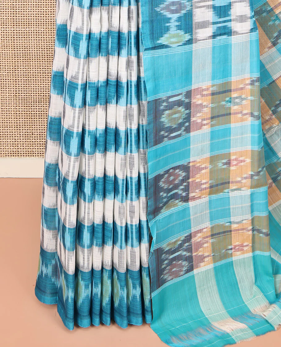 Off-White and Blue Ikkat Cotton Saree, Bedecked with Ikkat Checks All Over Its Body, Subtly Sparkled Ikkat-Textured Border, Ikkat-Textured Pallu, and Has No Blouse - Image 3
