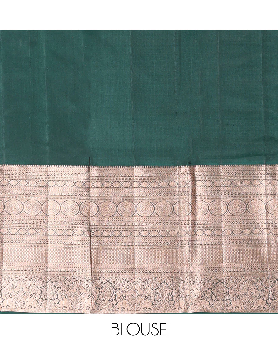Orange Vasundhara Silk Saree Gracefully Embellished with Dobby-Style Zari Buttas, Highlighted by a Contrast Border of Rekku, Kathir, Cross Kamalam, Chakram, Mayil Kann, Mayil, and Yaanai, Scintillating Jaal Pallu, and Paired with a Contrast Blouse - Image 6