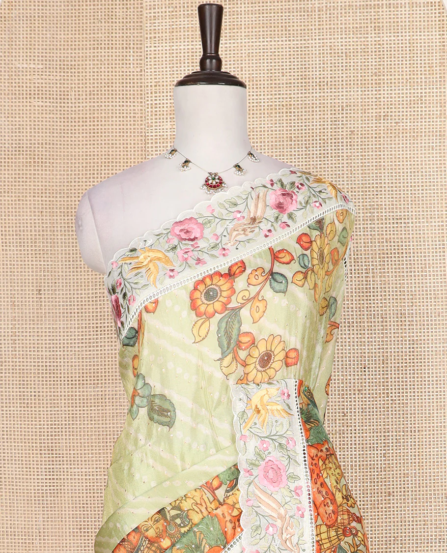 Pastel green buttas with bandhani and kalamkari floral-human motifs printed dola silk saree, contrast floral embroidered scallop border - Image 3