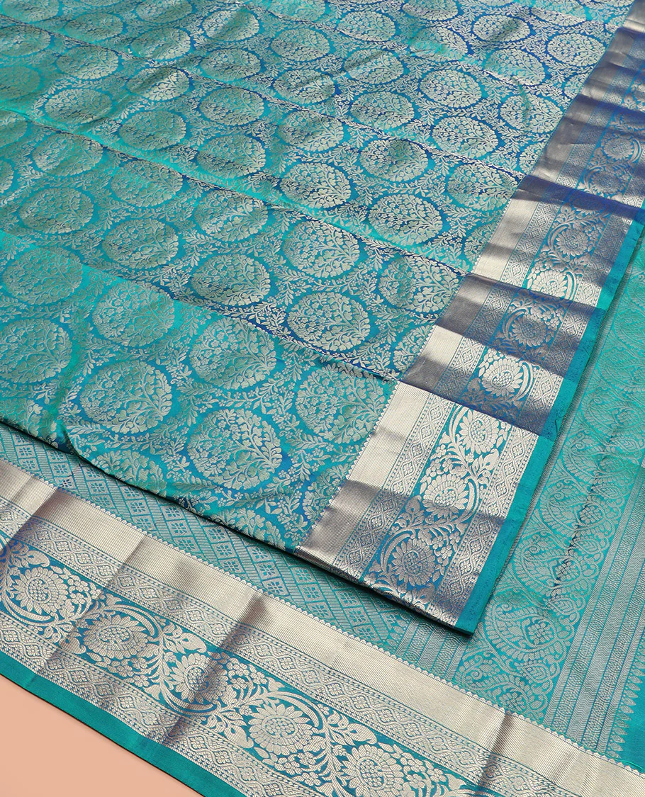 Peacock Blue Kanchipuram Silk Saree Opulently Embellished with Jacquard Design, Highlighted with Zari Border of Rekku, Ogee, and Kodi Visiry Designs, Elegantly Detailed Pallu of Geometric Designs, and Paired with a Matching Blouse - Image 3