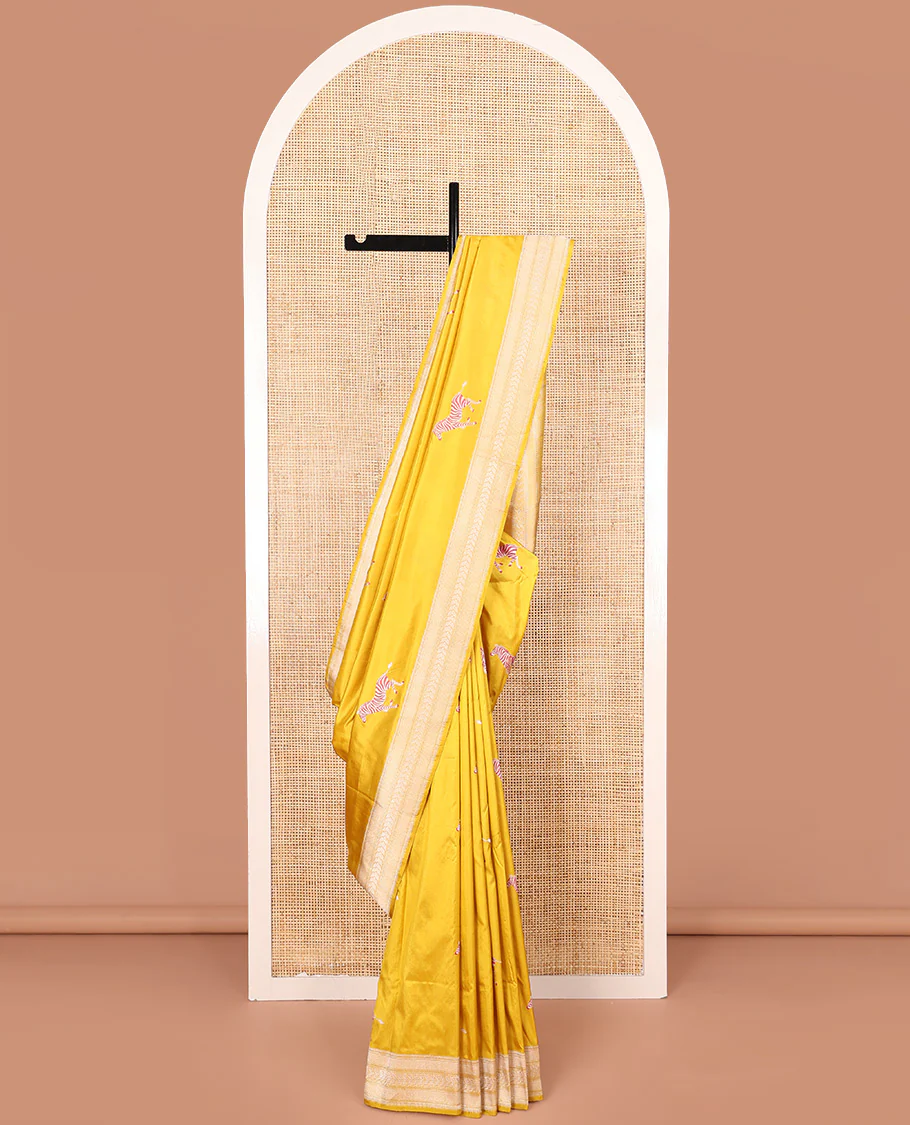 Yellow Banarasi Silk Saree Elevated with Zebra Motifs All Over Its Body, a Subtle Border of Traditional Designs, Pallu Decked Up with Floral and Diamond Designs, and Paired with a Matching Blouse - Image 5