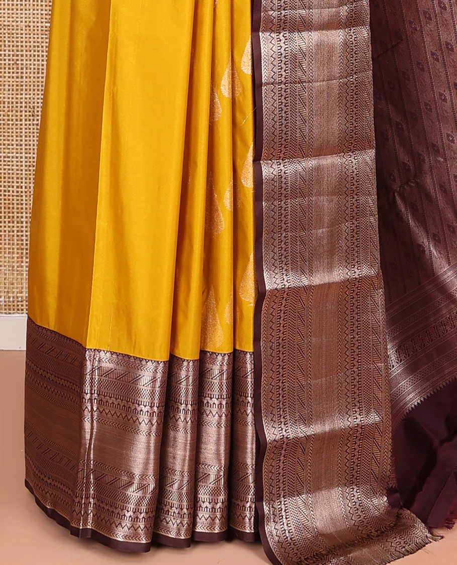 Yellow Budget Silk Saree, Ornamented with Zari Buttas All Over Its Body, Complemented by Contrast Border of Traditional Designs Woven in Zari, Gracefully Embellished Pallu, and Paired with a Contrast Blouse - Image 3